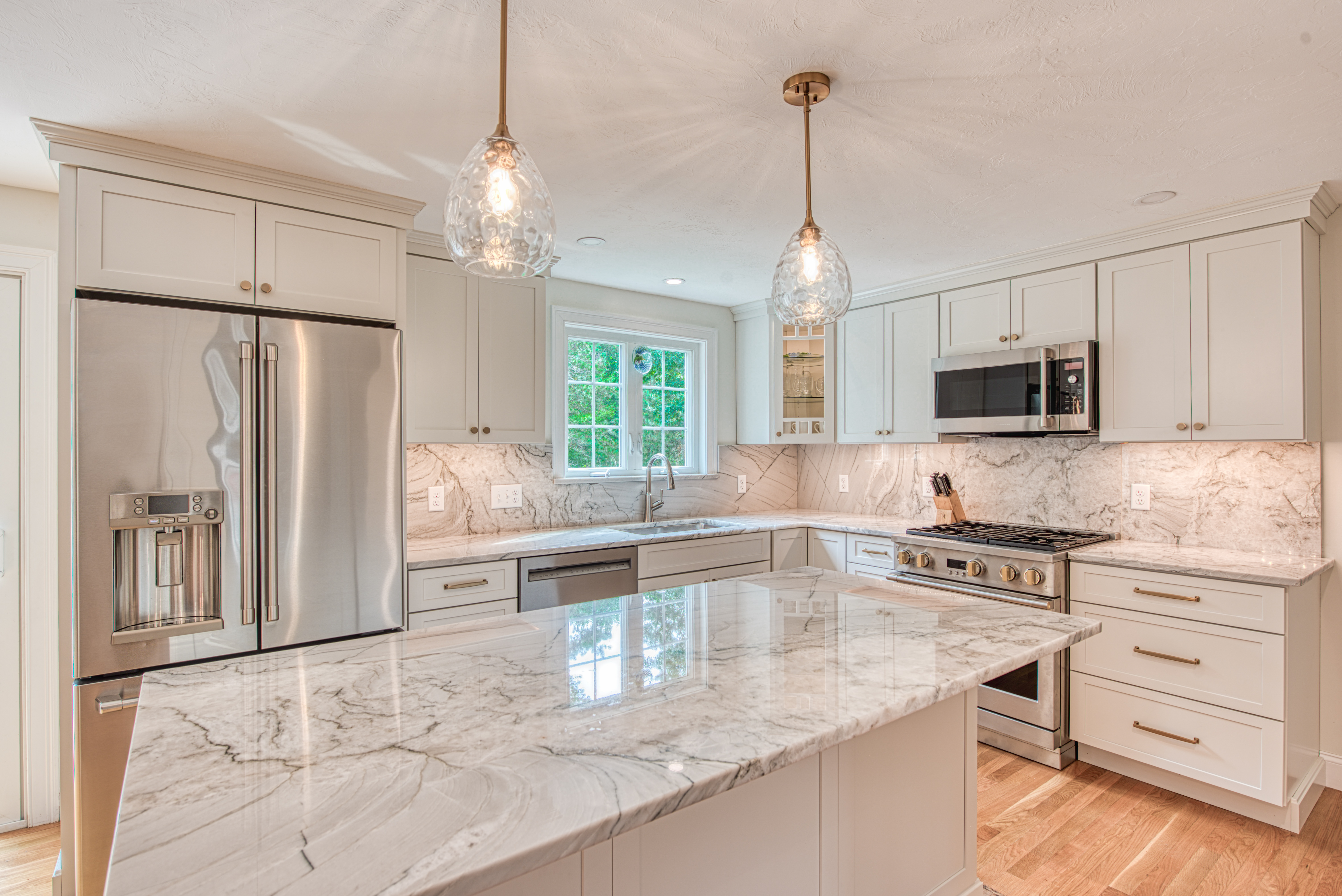 Photo of white counter top in kitchen remodel