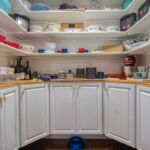 Doors open up to a pass-through pantry!